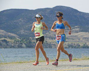  Lisa Bentley (right) and Lori Bowden during the run as part of Team Fraser’s relay team at the 2012 Subaru Ironman Canada. (Photo: David McColm)