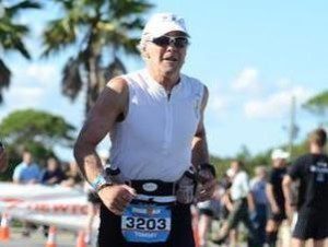 Tommy Lettner on the run at Ironman Florida 2013 - Finisherpix