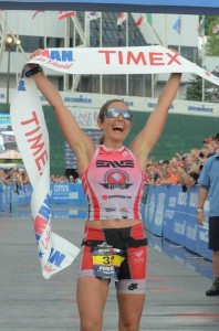 Amber Ferreira wins the 2014 Ironman Lake Placid (Photo by Liz Kreutz)