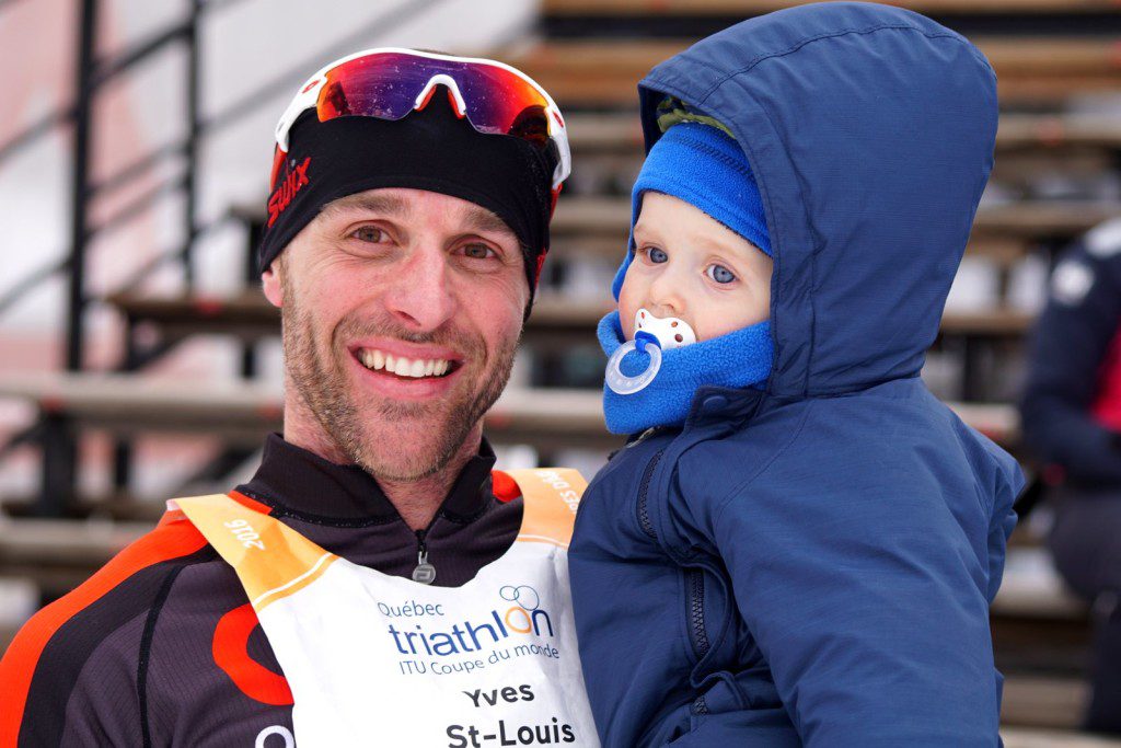 Supporting dad - Yves St. Louis is greeted by his one-year-old son Mathieu at the finish line.