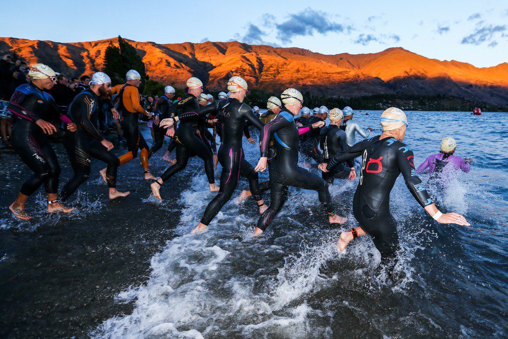 WANAKA, NEW ZEALAND - FEBRUARY 20: Competitors start the swim leg during 2016 Challenge Wanaka on February 20, 2016 in Wanaka, New Zealand. (Photo by Hagen Hopkins/Getty Images)